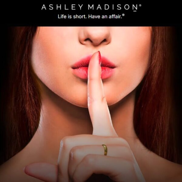 Ashley Madison review image showing a woman with a finger to her lips symbolising secrecy, representing the site’s discreet dating focus, Ashley Madison cost and legitimacy review.